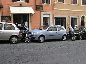 Parking in central Rome, Italy. Although the c...