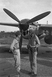 (L-R) Thomas B. McGuire and Charles Lindbergh discussing a mission on Biak Island in July 1944 Thomas B. McGuire (L) and Charles Lindbergh (R).jpg