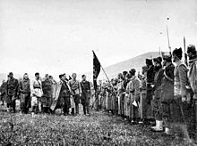 Tito predaje zastavu Prvoj proleterskoj brigadi.jpg