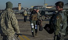 A female U.S. Air Force fighter pilot at Osan Air Base in South Korea US Female F-16 Fighter Pilot Capt Brittany Trimble steps from her jet prior to VIGILANT ACE 18 at Osan Air Base, Republic of Korea-4004018.jpg