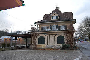 Three-story building with hip roof