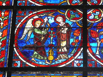 Edseur un vitrau du XIIIe sièke d’el catédrale Nou-Danme ed Laon.