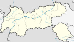 Mapa konturowa Tyrolu, w centrum znajduje się punkt z opisem „Innsbruck”