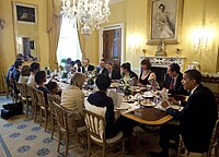 The Obamas host the first White House Passover Seder in 2009 (White House photo). Barack Obama hosts a Seder dinner 2009.jpg