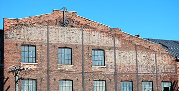 South side wall, 2009. Note construction date and remnants of "Detroit Shipbuilding Machine Shop" sign