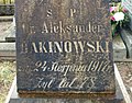 Fragment nagrobka Aleksandra Feliksa Bakinowskiego (suwalski cmentarz przy ulicy Bakałarzewskiej)