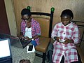 Female wikipedians editing with android phone
