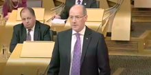 Cabinet Secretary for Finance, Employment and Sustainable Growth John Swinney delivering the draft Scottish budget, September 2012 John Swinney Budget Statement.png