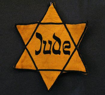 Yellow badge Star of David called "Judens...