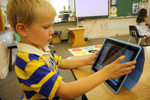 A child using a tablet Kindergarten iPad.jpg