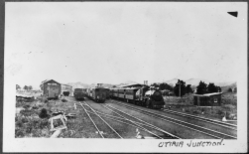 Otiria Junction showing railway yards, the railway station, and several trains, 1930s