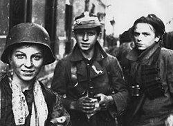 Polish Boy Scouts played an important role in the Warsaw Uprising. Polish Boy Scouts fighting in the Warsaw Uprising.jpg