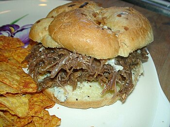 Pulled pork is a form of barbecue. It is a met...