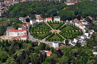 Putbus Circus, residence of officials and administration, with the empty former location of the palace, bottom left