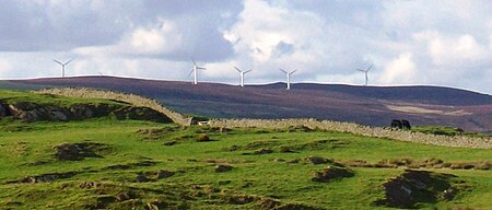 Wind turbines such as these, in Cumbria, England, have been opposed for a number of reasons, including aesthetics, by some sectors of the population. Wind tubines cumbria.JPG