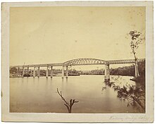 Historical photo of railway bridge over a river