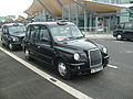 Image 42TX4 London Taxi at Heathrow Airport.