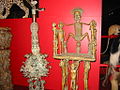 A display of African art, mainly metalwork