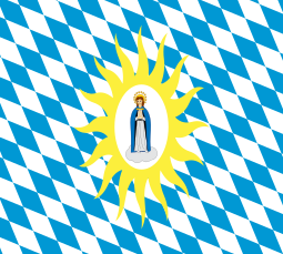Дева Мария, молящаяся на облаке, увенчанная славой; на белом овале; окруженный сиянием желтых лучей; на поле бело-синих леденцов в баварском стиле