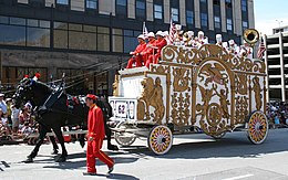 A literal "bandwagon", from which the metaphor is derived. Circus-Parade white-bandwagon Jul09.jpg