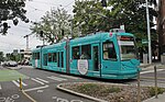 An Inekon 121 Trio streetcar on the Broadway section of the First Hill Streetcar in June 2018