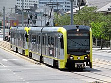 Los Angeles' expansion of mass transit has been driven in large part by light rail. Gold Line train on East 1st Street, July 2017.JPG
