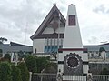 Monumen Sisingamangaraja XII di depan Kantor Bupati Tapanuli Utara, juga terdapat gambar bendera Sisingamangaraja XII.