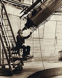 Percival Lowell in 1914, observing Venus in the daytime with the 24-inch (61 cm) Alvan Clark & Sons refracting telescope at Flagstaff, Arizona Percival Lowell observing Venus from the Lowell Observatory in 1914.jpg