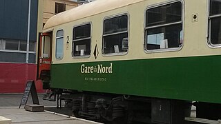 Ancien wagon provenant du dépôt ferroviaire de la gare du nord, à Berlin, aménagé en restaurant végan (quartier d'Agniesebuurt)[6],[7].