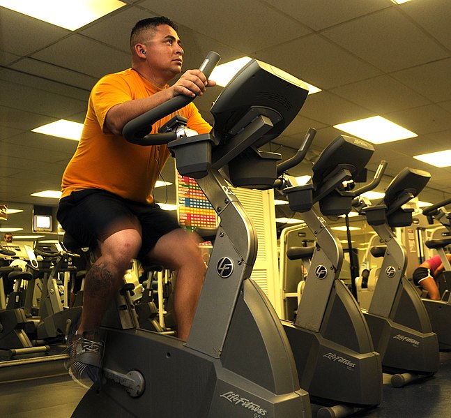 File:US Navy 100120-N-7498L-025 enior Chief Navy Counselor Tony Peraza assigned to Navy Recruiting District Los Angeles works out on a stationary bike.jpg