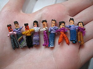 An assortment of Guatemalan worry dolls made f...