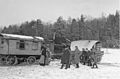 Polizei bei gestellter Razzia von Sinti und Roma-Wohnwagen im Winter in Renningen - Leonberg 1937/38 Ein Bild dieser Serie findet sich bei Arnold: Die Zigeuner S. 74 mit der Bildbeschreibung: "Polizei kontrolliert Wanderzigeuner um 1925 in Oberschwaben" dort mit Archiv Arnold als Quelle angegeben