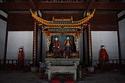 Interior view of the back hall, with the statue of Cao'e's parents in a pavilion, flanked by statues