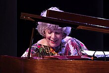 Caroline Dahl playing piano at the Sofia Theater in Sacramento, California