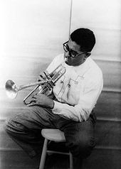 Dizzy Gillespie, 1955 Dizzy Gillespie playing horn 1955.jpg