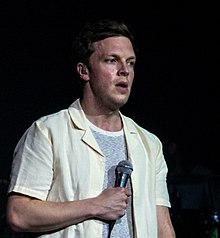 Macfarlane performing at a Friendly Fires concert in 2018