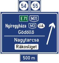 Panneau d'avertissement de sortie d'autoroute à 500 mètres sans affectation de voies (numéro et nom de la sortie)