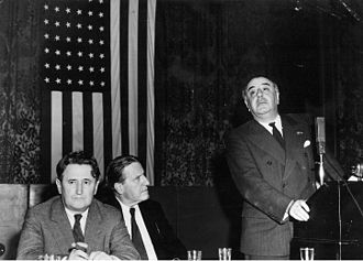 Left to right: Nahum Goldmann, Stephen Wise, and French lawyer Henry Torres (speaking) at a World Jewish Congress conference in New York City, 7 June 1942 Nahum Goldmann, Stephen Wise, Henri Torres at World Jewish Congress conference in New York, June 1942.jpg