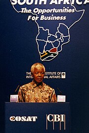 Nelson Mandela delivering a speech at the Chatham House conference 'South Africa: The Opportunities for Business', 10 July 1996. Nelson Mandela at the 'South Africa The opportunity for business' conference, Chatham House..jpg