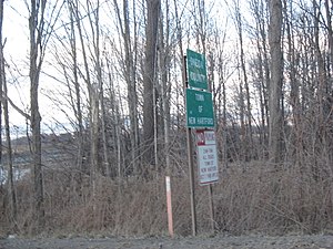 Entering New Hartford and شهرستان اونیدا، نیویورک along County Route 24A.