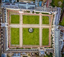 View showing in red the path of the Great Court Run and in blue the shortcuts on the cobbles Trinity College Great Court drone view.jpg