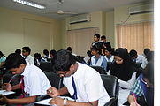 Participants competing in the article writing contest