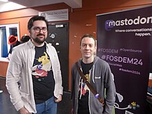 Two Mastodon developers at the Mastodon booth at FOSDEM 2024 2024-02-03 FOSDEM 028.jpg