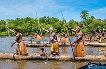 Canoe warriors in Asmat Culture Festival Canoe Warriers in West Papua.jpg