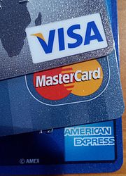 Visa, MasterCard, and American Express are card-issuing entities that set transaction terms for merchants, card-issuing banks, and acquiring banks. Credit card logos (2015-12-1816-27-350044).jpg