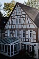Denkmalgeschütztes Gebäude, Haupthaus Eschollmühle mit Fachwerkgiebel in Darmstadt-Eberstadt, An der Eschollbrücke 28