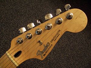 The headstock shape of the Stratocaster is tra...