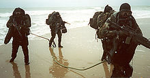 United States Marine Corps amphibious reconnaissance team infiltrates a beachhead Marine Force Recon -001-.jpg