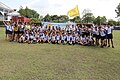 A group photo of Nan Chiau High School track and field team at the Inter-school Combined Sports Meet in 2013.