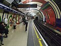 Piccadilly Circus tube stn Piccadilly westbound look east.JPG